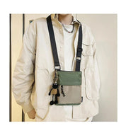 Noah | Kleine kompakte Canvas Crossbody Sling Tasche