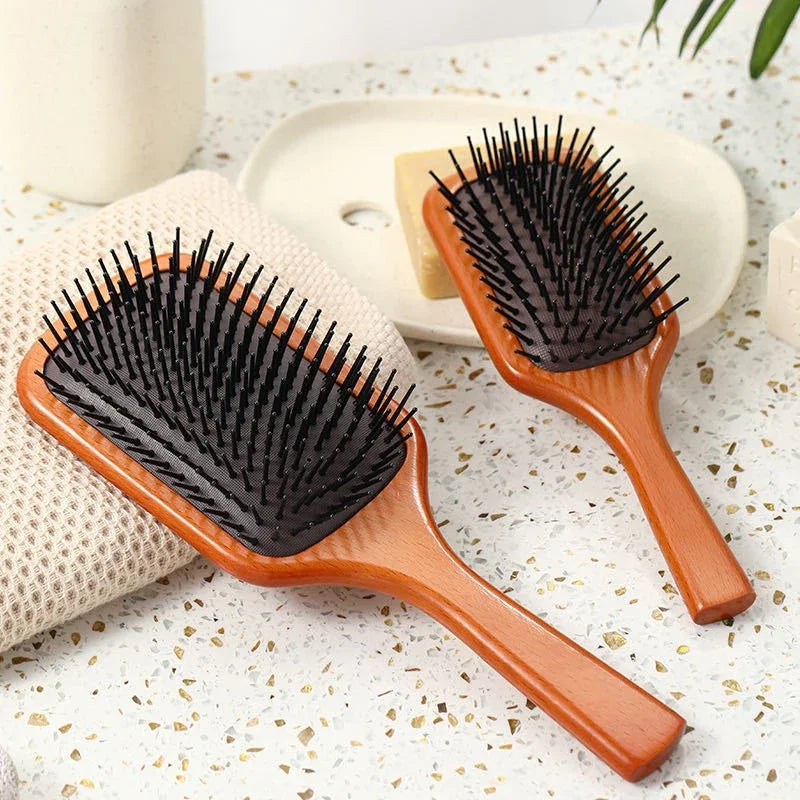 Hydravibe - Kopfhautmassagekamm mit Haaröl Sprühfunktion 1