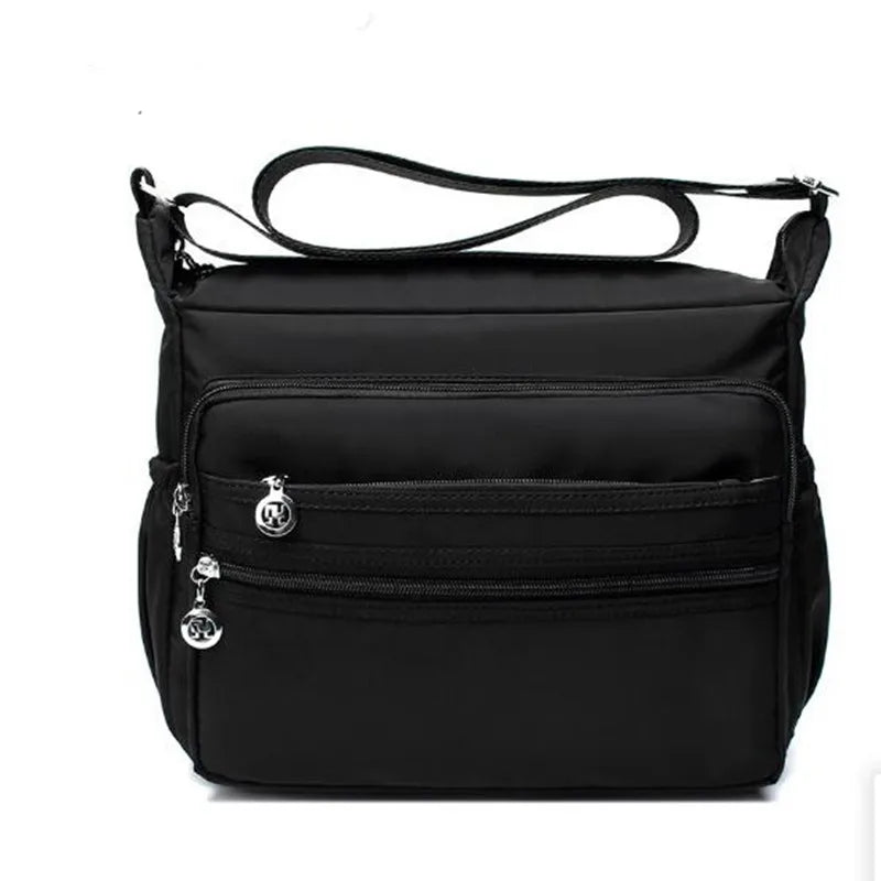 Maya | Leichter Multi-Taschen Nylon Crossbody Messenger Reisetasche