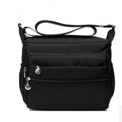 Maya | Leichter Multi-Taschen Nylon Crossbody Messenger Reisetasche