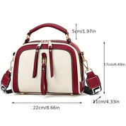 Eva | Kompakte Schultertasche mit Kontrastdetails